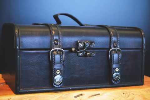 Vintage Leather Suitcase with Antique Lock Design