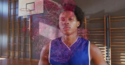 Focused Basketball Player Visualizing Energies in Gym