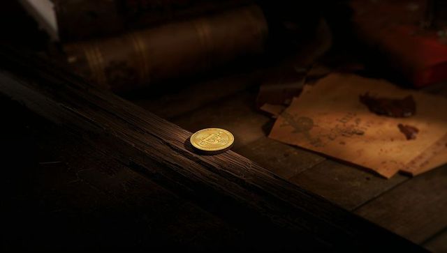 Gold Bitcoin Coin Resting on Rustic Wooden Beam with Wax-Sealed Map and Antique Scroll