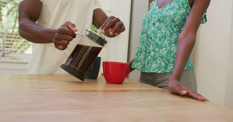 Morning Coffee Ritual Between African American Couple