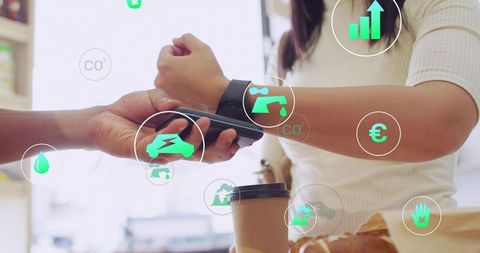 Scanning Smartwatch for Contactless Payment at Cafe Counter with Coffee and Pastry