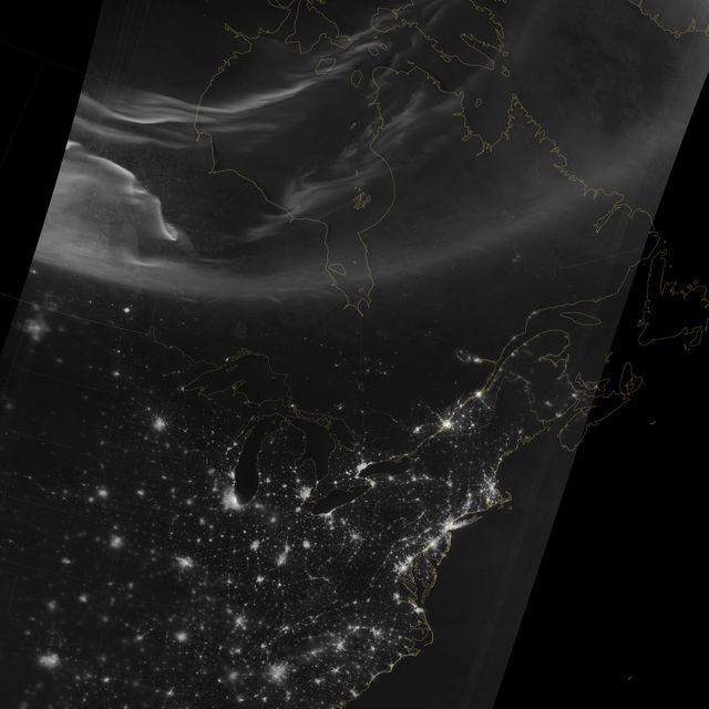 Using the “day-night band” (DNB) of the Visible Infrared Imaging Radiometer Suite (VIIRS), the Suomi National Polar-orbiting Partnership (Suomi NPP) satellite acquired this view of the aurora borealis on March 18, 2015. The northern lights stretch across Canada’s Quebec, Ontario, Manitoba, Nunavut, and Newfoundland provinces in the image, and are part of the auroral oval that expanded to middle latitudes because of a geomagnetic storm on March 17, 2015.  The DNB sensor detects dim light signals such as auroras, airglow, gas flares, city lights, and reflected moonlight. In the case of the image above, the sensor detected the visible light emissions as energetic particles rained down from Earth’s magnetosphere and into the gases of the upper atmosphere. The images are similar to those collected by the Operational Linescan System flown on U.S. Defense Meteorological Satellite Program (DMSP) satellites for the past three decades.  Auroras typically occur when solar flares and coronal mass ejections—or even an active solar wind stream—disturb and distort the magnetosphere, the cocoon of space protected by Earth’s magnetic field. The collision of solar particles and pressure into our planet’s magnetosphere accelerates particles trapped in the space around Earth (such as in the radiation belts). Those particles are sent crashing down into Earth’s upper atmosphere—at altitudes of 100 to 400 kilometers (60 to 250 miles)—where they excite oxygen and nitrogen molecules and release photons of light. The results are rays, sheets, and curtains of dancing light in the sky.  Read more: <a href="http://earthobservatory.nasa.gov/NaturalHazards/view.php?id=85556&amp;eocn=home&amp;eoci=nh" rel="nofollow">earthobservatory.nasa.gov/NaturalHazards/view.php?id=8555...</a>  NASA Earth Observatory image by Jesse Allen, using VIIRS day-night band data from the Suomi National Polar-orbiting Partnership. Suomi NPP is the result of a partnership between NASA, the National Oceanic and Atmospheric Administration, and the Department of Defense. Caption by Mike Carlowicz and Adam Voiland.  Credit: <b><a href="http://www.earthobservatory.nasa.gov/" rel="nofollow"> NASA Earth Observatory</a></b>  <b><a href="http://www.nasa.gov/audience/formedia/features/MP_Photo_Guidelines.html" rel="nofollow">NASA image use policy.</a></b>  <b><a href="http://www.nasa.gov/centers/goddard/home/index.html" rel="nofollow">NASA Goddard Space Flight Center</a></b> enables NASA’s mission through four scientific endeavors: Earth Science, Heliophysics, Solar System Exploration, and Astrophysics. Goddard plays a leading role in NASA’s accomplishments by contributing compelling scientific knowledge to advance the Agency’s mission.  <b>Follow us on <a href="http://twitter.com/NASAGoddardPix" rel="nofollow">Twitter</a></b>  <b>Like us on <a href="http://www.facebook.com/pages/Greenbelt-MD/NASA-Goddard/395013845897?ref=tsd" rel="nofollow">Facebook</a></b>  <b>Find us on <a href="http://instagrid.me/nasagoddard/?vm=grid" rel="nofollow">Instagram</a></b>
