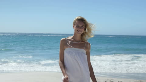 Joyful Woman Enjoying a Day at the Beach with Panorama