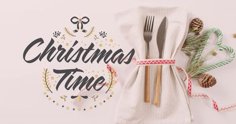 Elegant Christmas Celebration Table Set with Holiday Decorations