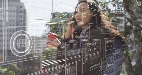 Urban commuter walking, talking on smartphone, holding coffee with hud data overlay