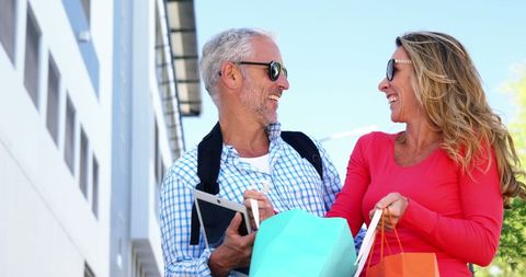 Happy Senior Couple Enjoys Sunny Day Shopping - Download Free Stock Images Pikwizard.com