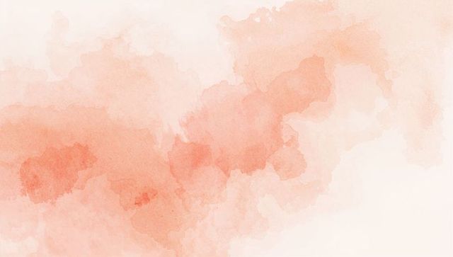 Drifting peach coral watercolor wash with soft granulation and paper tooth texture