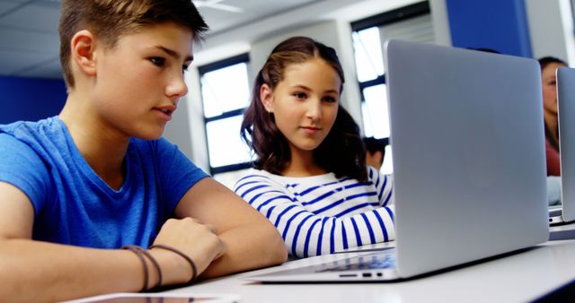 Teenage Students Using Laptops in Classroom - Download Free Stock Images Pikwizard.com