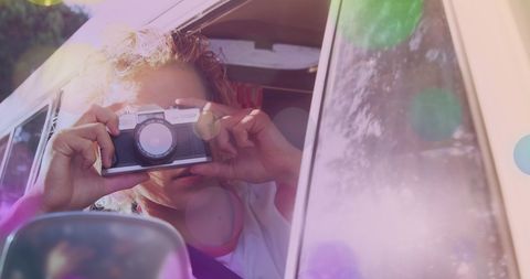 Young Woman Capturing Memories on Camera - Download Free Stock Images Pikwizard.com
