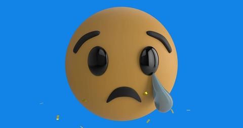 Crying Face Emoji with Golden Confetti on Blue