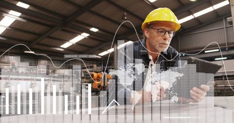 Engineer Analyzing Data with Tablet in Industrial Setting