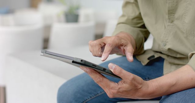 Person Using Tablet Device at Home Close-Up - Download Free Stock Images Pikwizard.com