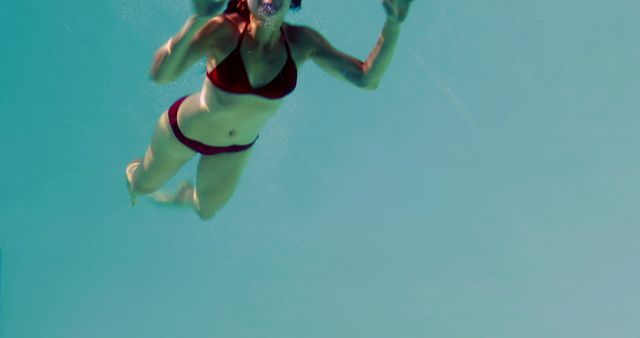 Woman Swimming Underwater in Red Bikini - Download Free Stock Images Pikwizard.com