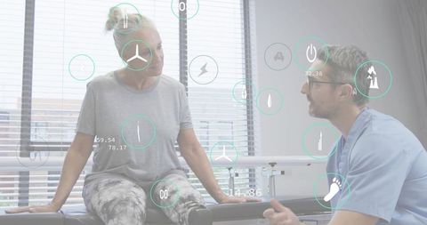 Senior woman consulting physical therapist in clinic with futuristic health hud overlay