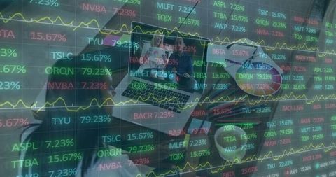 Online meeting and stock market analysis on desk overlay