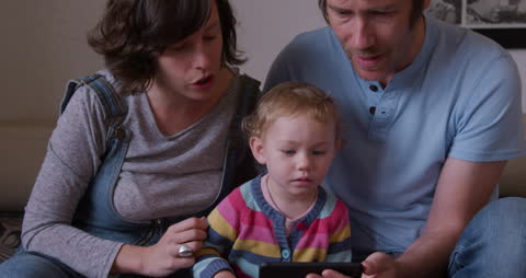 Family Enjoying Quality Time with Video Streaming at Home
