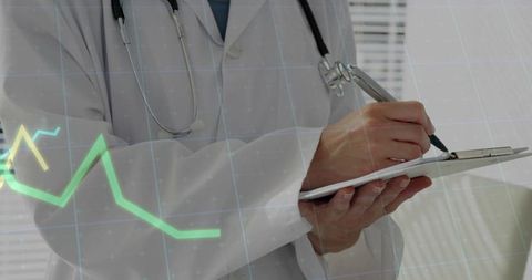 Female clinician writing on medical chart with stethoscope and digital ecg overlay