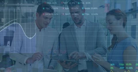 business team analyzing digital financial data in office setting - Download Free Stock Images Pikwizard.com