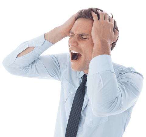 Frustrated man in office attire expressing emotion with hands on head