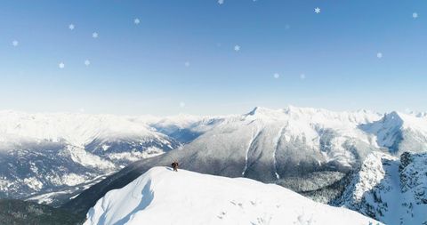 Snow-covered Mountain Adventure with Falling Snowflakes