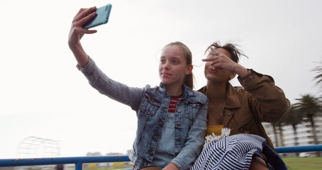 Teenage Friends Taking Selfie Outdoors During Summer Day - Download Free Stock Photos Pikwizard.com