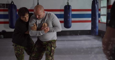 Martial Arts Grappling Practice in Gym Environment