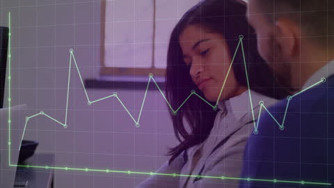 Colleagues Analyzing Financial Data on Digital Display