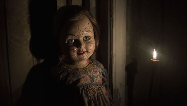 Creepy porcelain doll in flickering candlelight ambiance