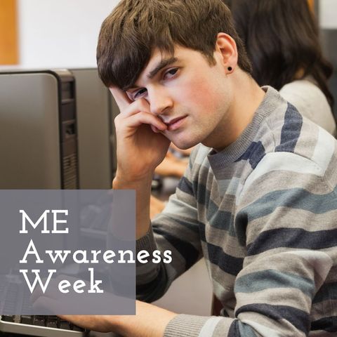 Fatigued Young Man at Desk Promoting ME Awareness Week - Download Free Stock Templates Pikwizard.com