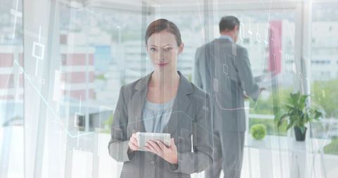 Caucasian Businesswoman Analyzing Financial Data on Tablet in Office - Download Free Stock Images Pikwizard.com