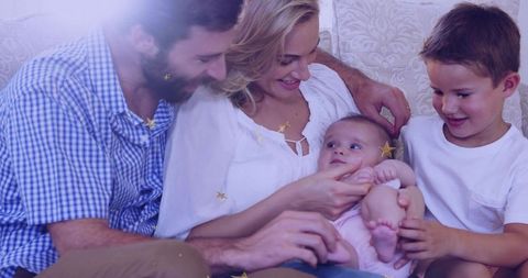 Loving Family Bonding with Newborn Baby at Home