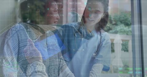 Doctor and Patient Reviewing Modern Technological Health Data in Clinic