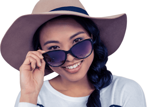 young woman expressing happiness while wearing sunglasses and stylish hat, adding a touch of joy to fashion presentations. ideal for marketing related to summer collections, travel brochures, and upbeat advertising campaigns, focusing on cheerful personalities in modern fashion.