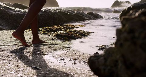 Barefoot Walk on Rocky Beach at Sunrise - Download Free Stock Images Pikwizard.com