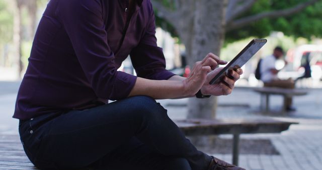 Young Professional Using Tablet in Urban Park - Download Free Stock Images Pikwizard.com