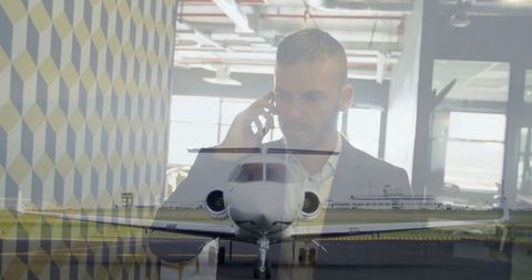 Businessman communicating beside a private jet representation