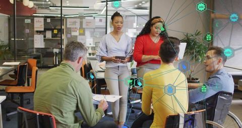 Multiracial Business Team Collaborating in Modern Office with Data Integration