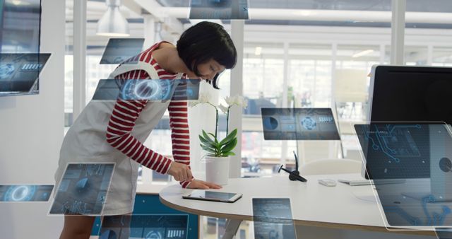 Woman Using Tablet with Virtual Holographic Images in Modern Office - Download Free Stock Images Pikwizard.com