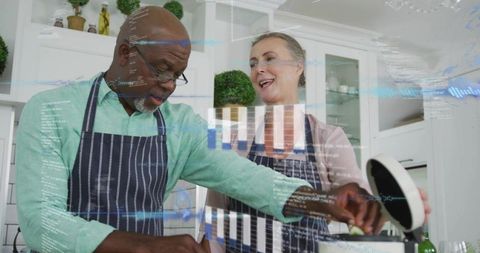 Mature interracial couple cooking together in modern kitchen with smart data overlays