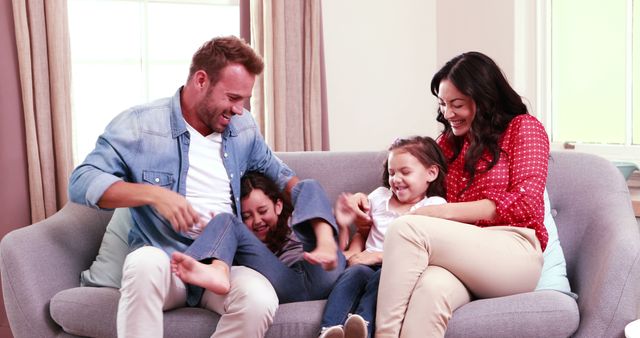 Happy Family Having Fun on Couch at Home - Download Free Stock Images Pikwizard.com