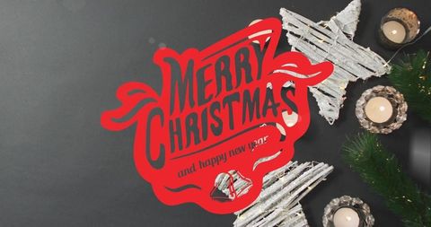 Festive christmas decoration with red greeting on elegant grey background