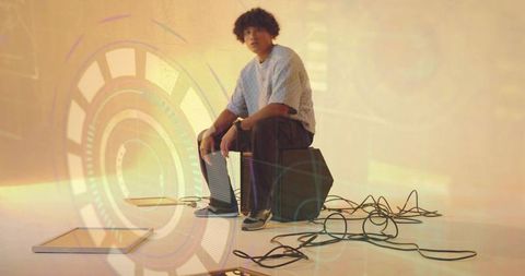 Man with Cables and Digital Interface in Futuristic Workspace