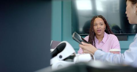 Professional at Office Meeting Engaging in Team Discussion