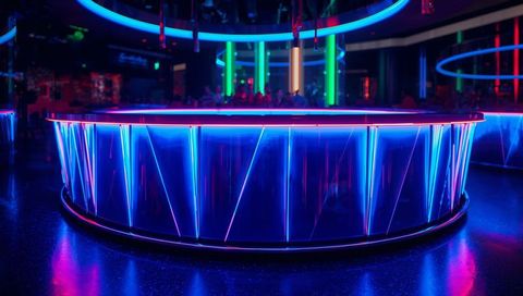 Glowing neon circular bar casting led rings and reflections in futuristic nightclub lounge