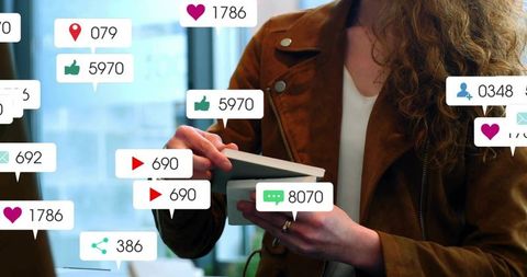 Designer reviewing fabric swatches with social media engagement overlays in studio