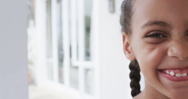 Close-up of Smiling Girl With Braided Hair - Download Free Stock Images Pikwizard.com