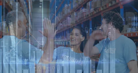 Diverse Team Celebrating Success in Warehouse with Overlayed Graphs