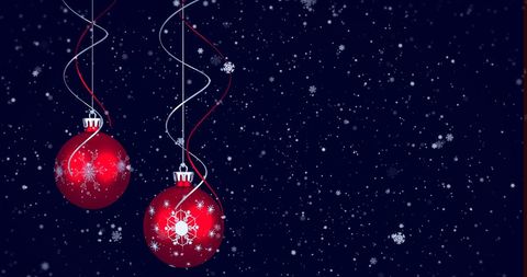 Festive Red Christmas Ornaments with Snowflakes at Night