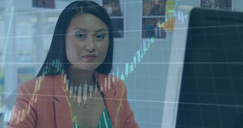 Confident Businesswoman Analyzing Stock Market Data