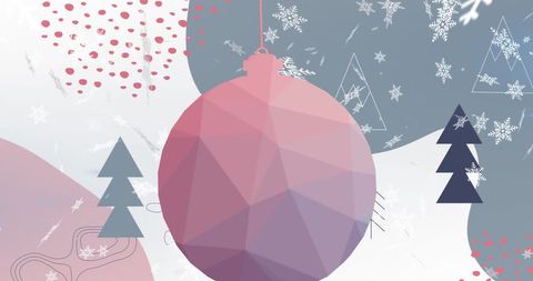 Snowy winter wonderland with geometric christmas bauble